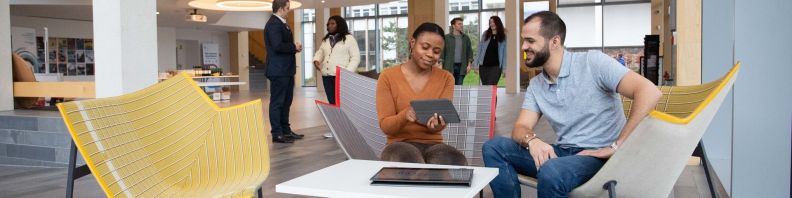 Students working at laptop