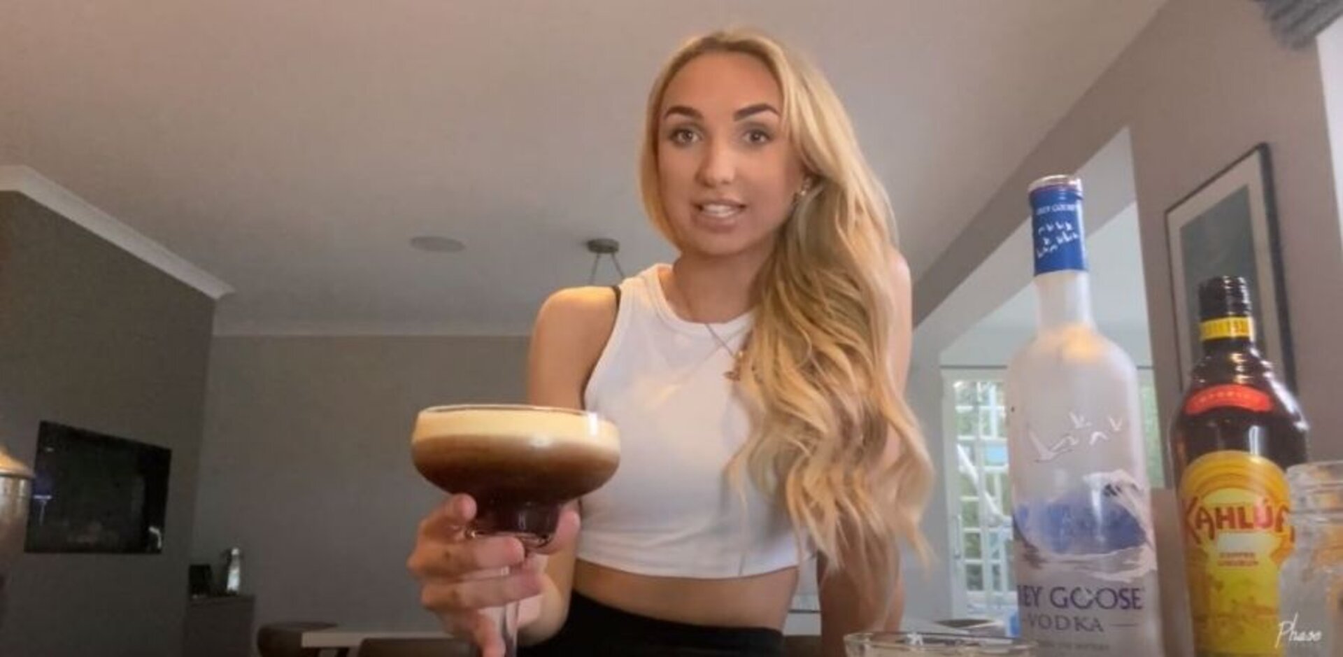 Project Manager Catherine Craig creating an espresso martini via Phase Events' YouTube channel