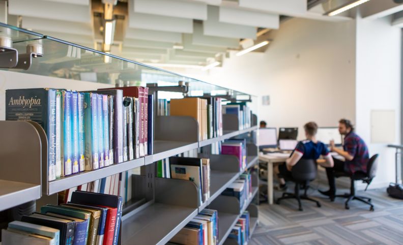 Bookshelves and studying in the Sir Alex Ferguson Library