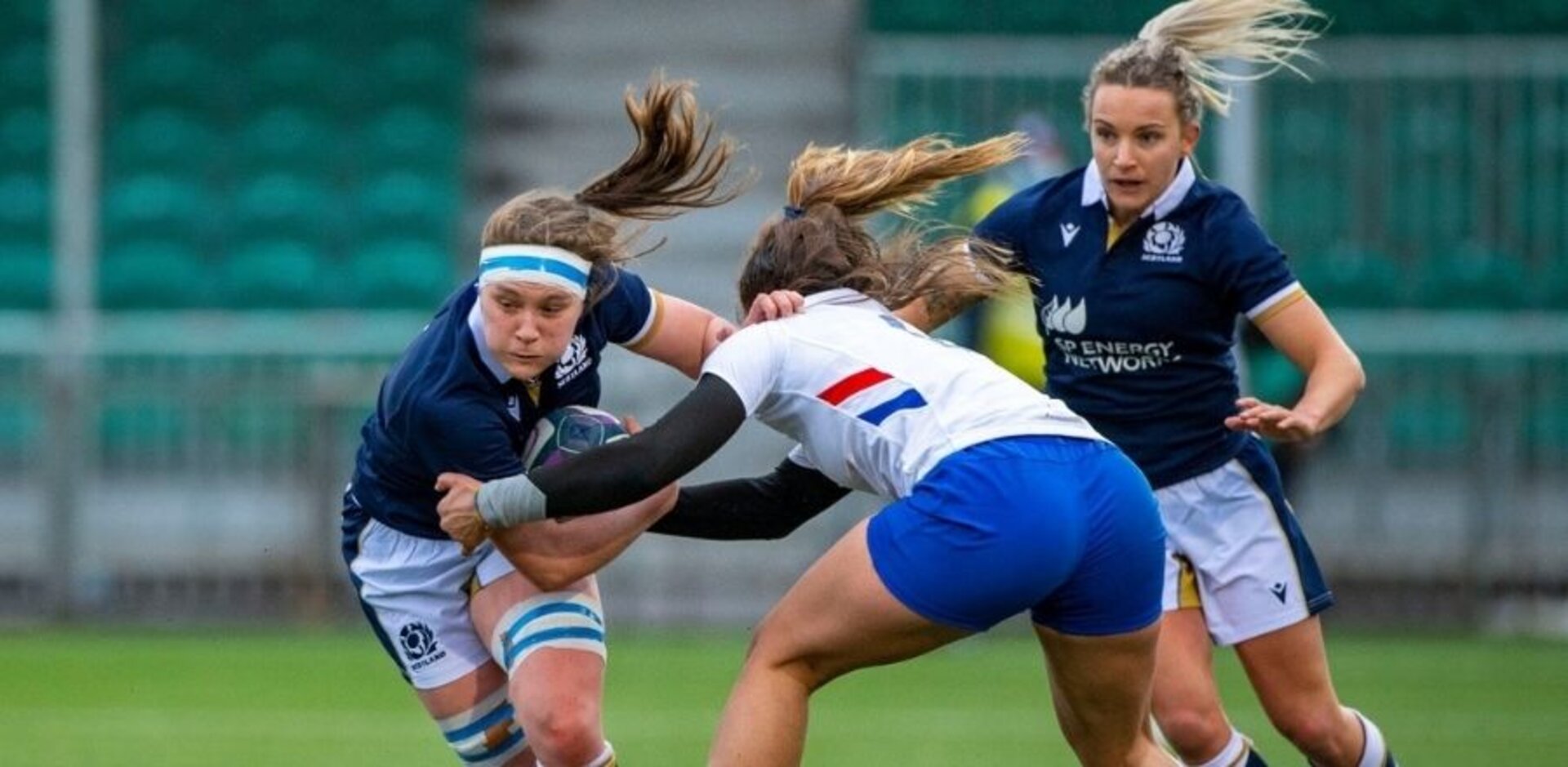 Rachel (left) first started playing rugby during her time at GCU