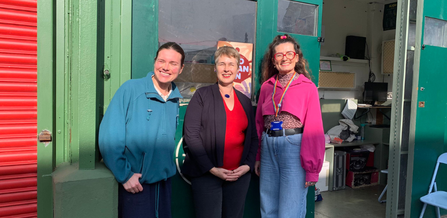 Professor Carol Emslie and Beth Meadows is pictured with radio presenter Amy Rodgers outside the Clyde Built Radio station